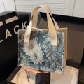 Floral embroidery cotton linen handbag with woven handles and secure metal clasp - Blue Webbing Style