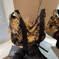 Borsa tote jacquard retrò con motivo floreale arancione e tracolla in tela nera - Nero