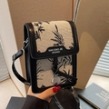 Chique beige canvas crossbody tas met zwart bloemenpatroon en lederen biesjes - Wit