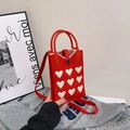 Mini borsa per cellulare in maglia rossa con motivi a cuore bianchi e tracolla - Rosso