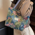 Blaue Canvas-Einkaufstasche mit Blumenmuster, Schmetterlingen und lila Tragegriffen - Blau Groß