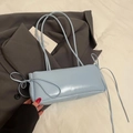 Light blue rectangular underarm bag with glossy finish and delicate side bow ribbons - Blue - Without Pendant