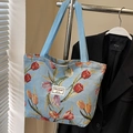 Light blue tulip patterned jacquard tote bag with woven brand label and strap handles - Large / Light Blue