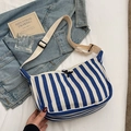 Sac bandoulière en toile à rayures bleues et blanches avec bandoulière réglable et style décontracté - Bleu clair