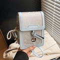 Light blue square crossbody bag with floral texture, pearl chain, and lucky charms - Blue With Heart Pearl Pendant