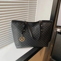 Dark grey tote bag with all-over M letter print and a golden metal M pendant - Black