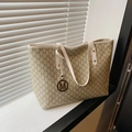 Beige tote bag with repeat M pattern, long handles and a round metal M charm decoration - Off White