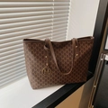 Brown tote bag with all-over M letter print and gold circular logo charm - Brown