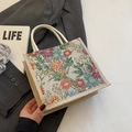 Floral woven tote bag with linen rope handles featuring daisy and narcissus embroidery - Zipper Style / Off White