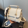Elegant cream white PU leather square crossbody bag with gold round hardware and bell charm - With Bell Pendant / White