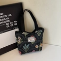 Retro black floral tapestry tote bag with colorful flower patterns and canvas handles - Black Small (Open)