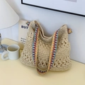 Straw hobo bag with beige openwork crochet texture and a vibrant colorful woven strap - Off-white