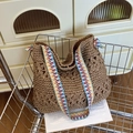 Brown woven straw tote bag with floral patterns and colorful geometric shoulder strap - Khaki