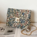 Ethnic floral envelope bag with colorful jacquard fabric and golden chain strap - Blue