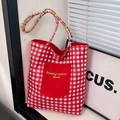 Red plaid canvas tote bag with woven handles and front pocket for daily commute - Red