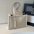 Chic off-white tote bag featuring floral embossed texture and stylish fringe pendant - Chinese Style Tassel Pendant / Off White
