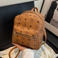 Sac à dos en cuir caramel avec imprimés monogrammes d'ours et de losanges partout - Marron
