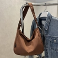 Brown canvas hobo bag with wide strap and large capacity for casual everyday fashion - Brown