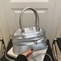 Metallic silver Boston handbag with top handles and adjustable crossbody strap - Silver