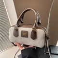 Bolso Boston vintage en lona beige y cuero marrón oscuro con silueta cilíndrica - Marrón