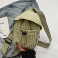 Light green checkered canvas crossbody bag with drawstring closure and wide shoulder strap - Green