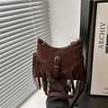 Vintage dark brown suede crescent shoulder bag featuring long fringe and metal buckle - Brown