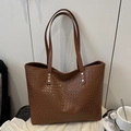 Chic brown woven texture tote bag with slim shoulder straps and silver rivets - Brown