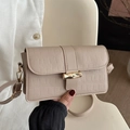 Beige crossbodytas met krokodillenreliëf, gouden bamboesluiting en verstelbare riem - Khaki