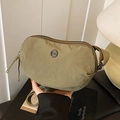 Olive green nylon crossbody bag with textured fabric and adjustable strap - Green