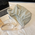 Light green nylon crossbody bag with drawstring detail and round coin purse pendant - Blue