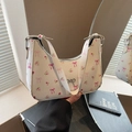 White floral shoulder bag with pink blossom print and silver bow detail for summer - White