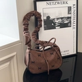 Borsa a mezzaluna in velluto a coste marrone con fiocchi neri e motivo a scacchi - Marrone