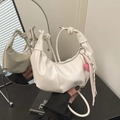 Creamy white half-moon underarm bag with pleated design and pink heart charm - White with Pink Heart Pendant
