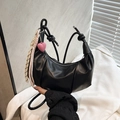 Chic black crescent underarm bag with pleated design and decorative heart charm - Black with Pink Heart Pendant