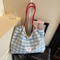 Blue and white checkered tote bag with contrasting red woven rope handles - Blue