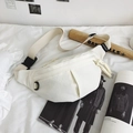 Cream canvas sling bag with adjustable strap and front pleated pocket in a minimal design - White