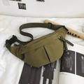 Olive green canvas crossbody chest bag with adjustable strap and paracord zip pulls - Green