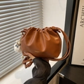 Chic brown ruched bucket bag with shoulder strap and a cute fluffy pompom charm - Brown With Long Leg Elf Pendant