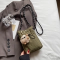 Mini-Umhängetasche in Olivgrün aus Nylon mit Kordelzug und gewebtem Seilschultergurt - Mit Anhänger / Grün