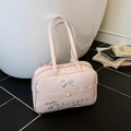 Pink patent leather tote bag featuring silver bow embroidery and shoulder straps - Pink