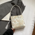 White brocade bucket bag with blue mountain scenery patterns and silver tassel detail - Silver With Tassel Pendant