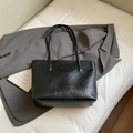 Minimalist black shiny leather tote bag with FASHION lettering for daily commute - Black Without Charm
