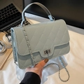 Light blue quilted leather handbag with silver chain strap and top handle for women - Blue