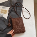 Brown leopard print crossbody phone bag with woven shoulder strap and tactile finish - Coffee With Woven Ball Pendant