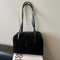 Retro large black suede shoulder bag with long straps and round button detail - Black (No Charm)