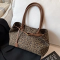 Large leopard print tote bag with brown leather handles and gold buckle detail - Green