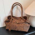 Chic leopard print faux suede tote bag with brown leather handles and gold hardware - Yellow