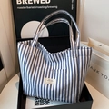 Minimalistische blauw-wit gestreepte canvas tote bag met grote capaciteit en voorvak - Blauw