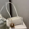 White faux shearling shoulder bag with brown plush monster charm and long straps - White with Brown Elf Charm