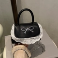 Mini borsa in pelle nera con ricamo in pizzo bianco e fiocco in argento per donna - Nero